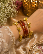 Svarna Ghungroo Luxe Collection – Gold-Finished Statement Bangles with Bell Cluster Detailing - Pair